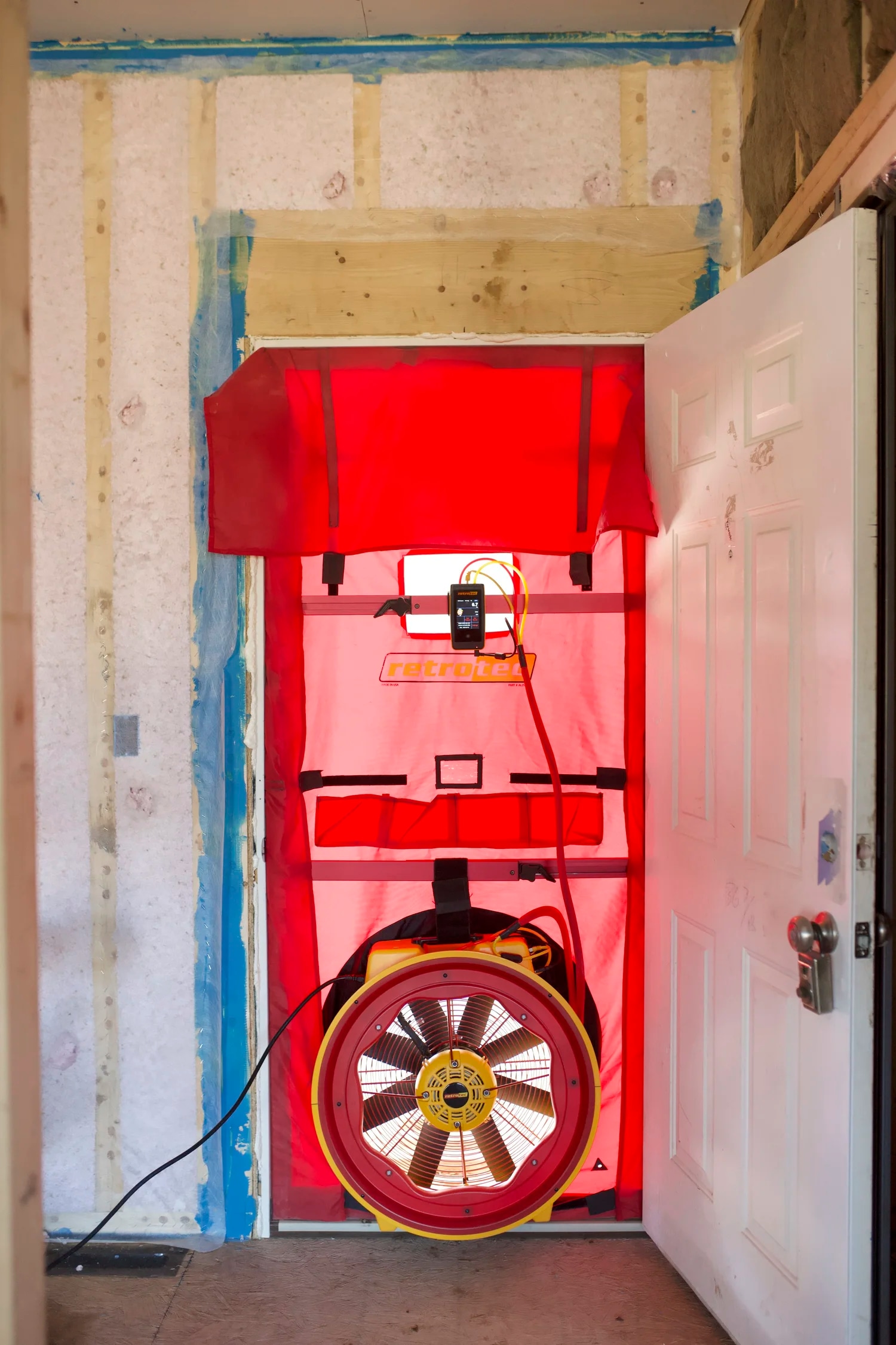 How Blower Door Test Companies Help Improve Building Performance