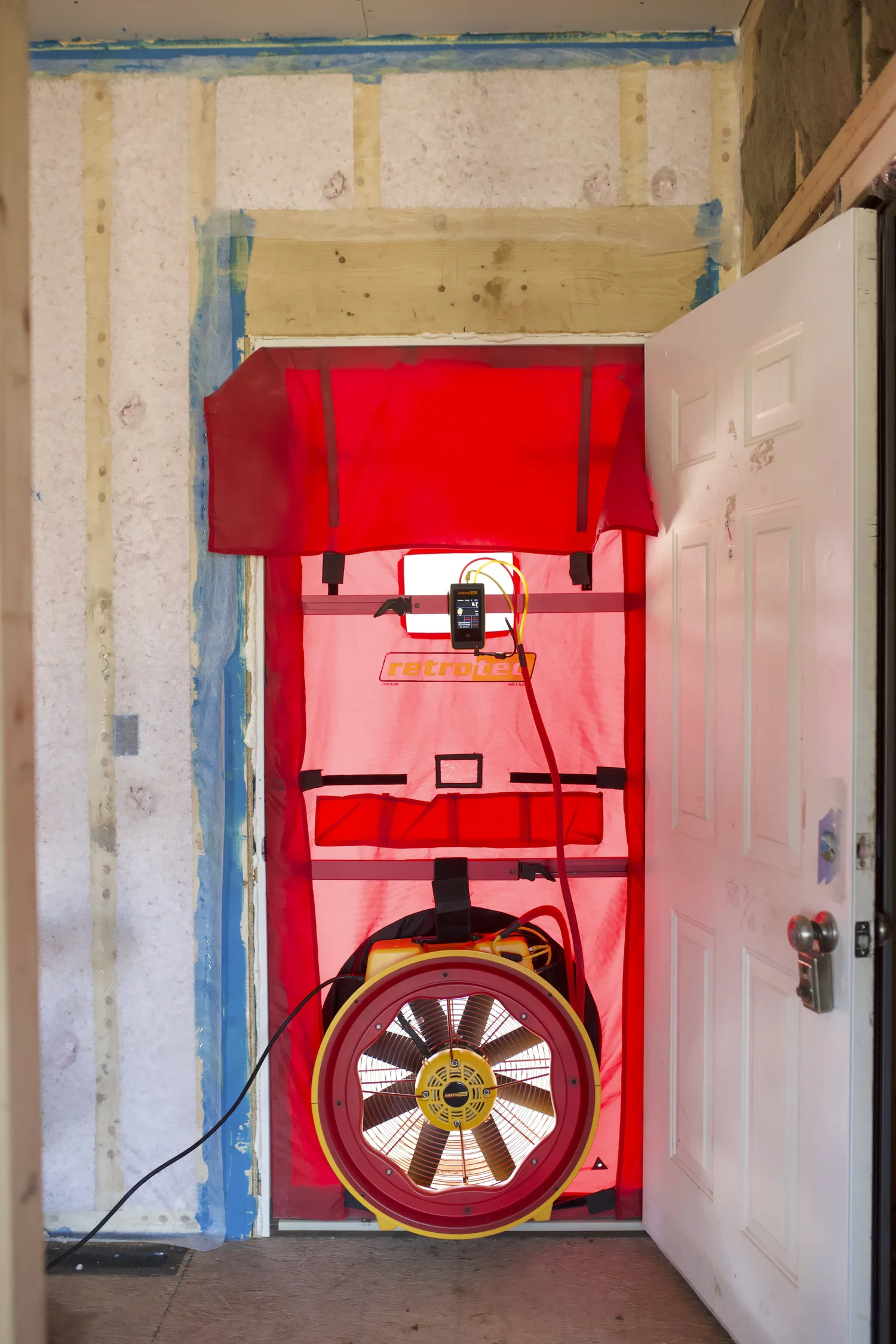 How Blower Door Test Companies Help Improve Building Performance