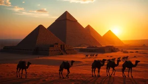 Pyraminds framed against a stunning sunset, with camels traversing the foreground.